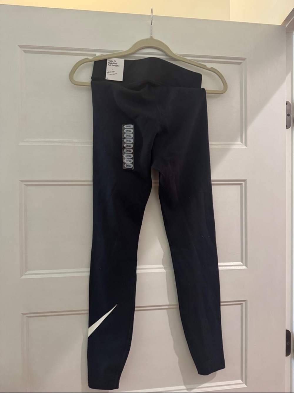 NWT Nike Black womens' Athletic Leggings with White Swoosh Sz. Small